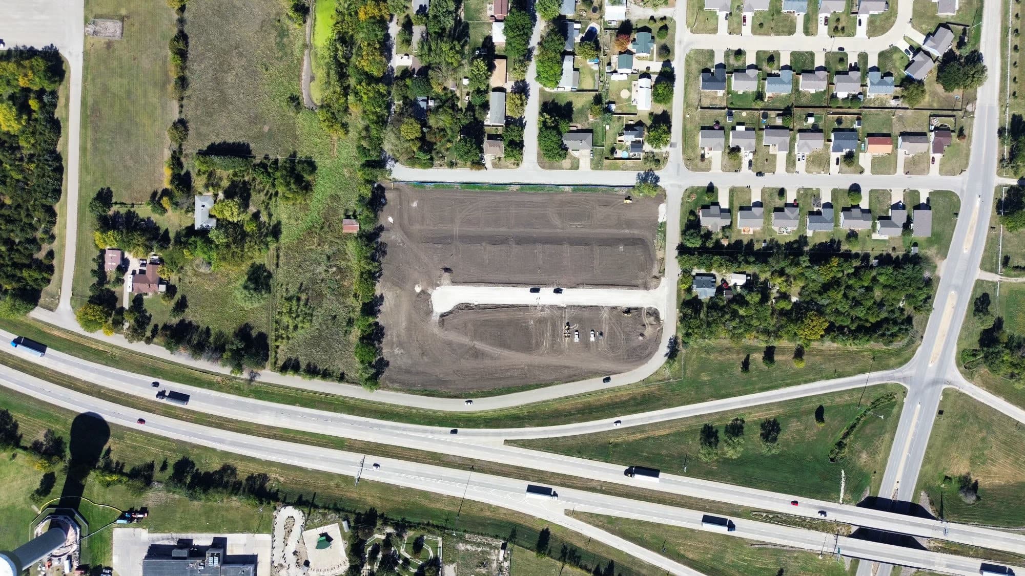 Aerial view of the Mahtropolis lot mid-grading, before the street went in.